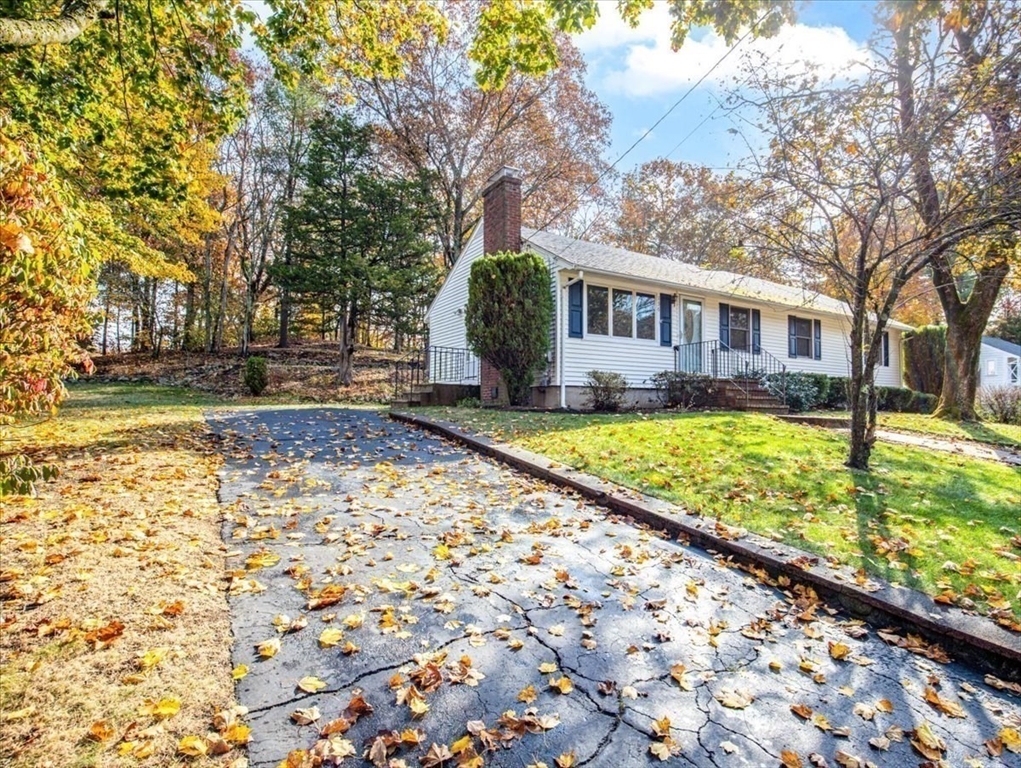 136 Beechnut Road Westwood, MA 02090 - Photo 36 of 42 a front view of a house with a yard