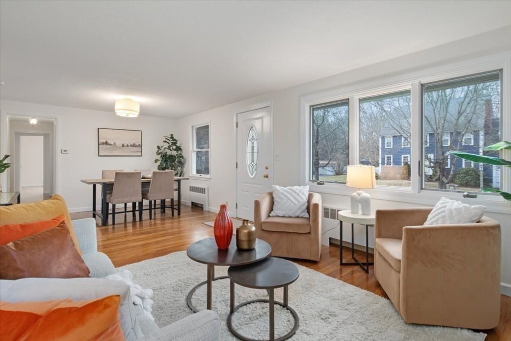 136 Beechnut Road Westwood, MA 02090 - Photo 7 of 42 a living room with furniture and a large window
