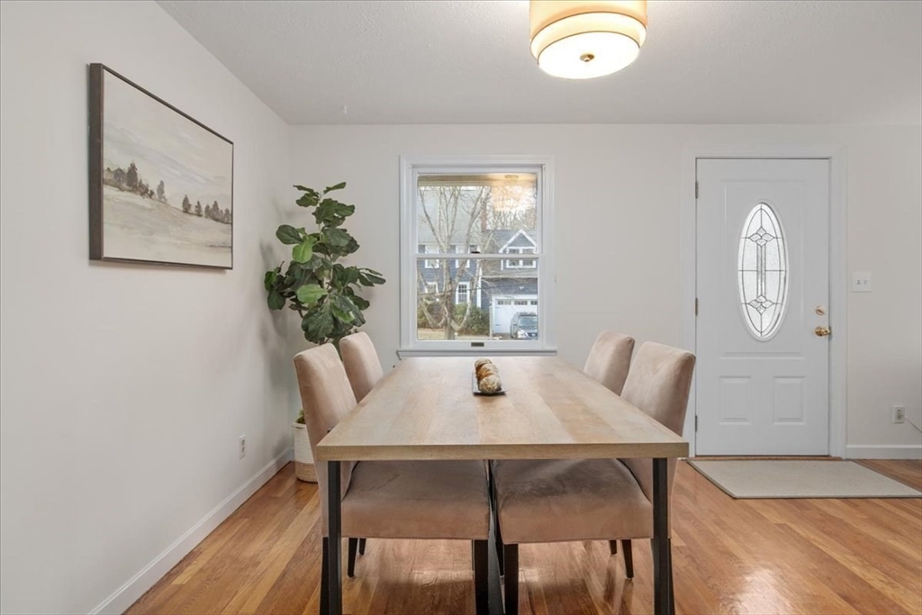 136 Beechnut Road Westwood, MA 02090 - Photo 8 of 42 a view of a dining room with furniture and wooden floor