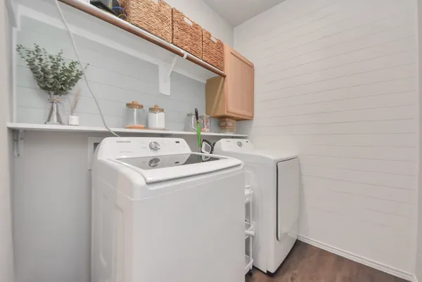 a utility room with dryer and washer