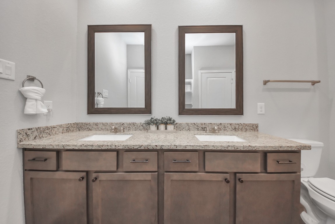 709 Little River Drive Montgomery, TX 77316 - Photo 26 of 40 a bathroom with a sink and a toilet