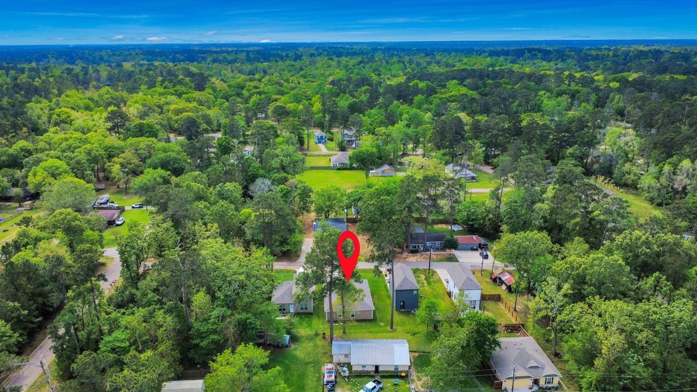 709 Little River Drive Montgomery, TX 77316 - Photo 37 of 40 a view of an outdoor space and a yard