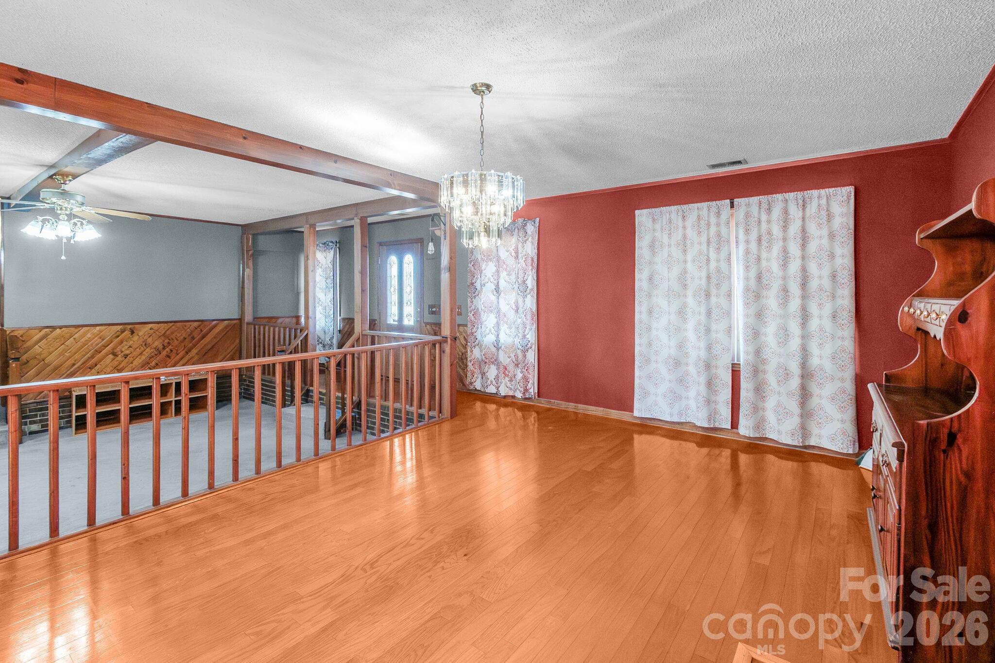 1295 Cattle Ridge Road Cheraw, SC 29520 - Photo 12 of 21 a view of a room with windows and stairs