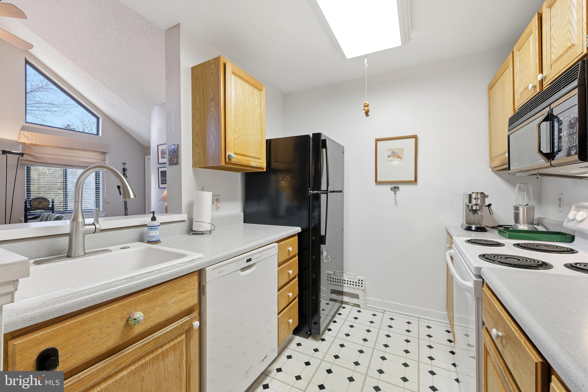 706 Augusta Circle Mount Laurel, NJ 08054 - Photo 14 of 31 a kitchen with stainless steel appliances a refrigerator sink and stove