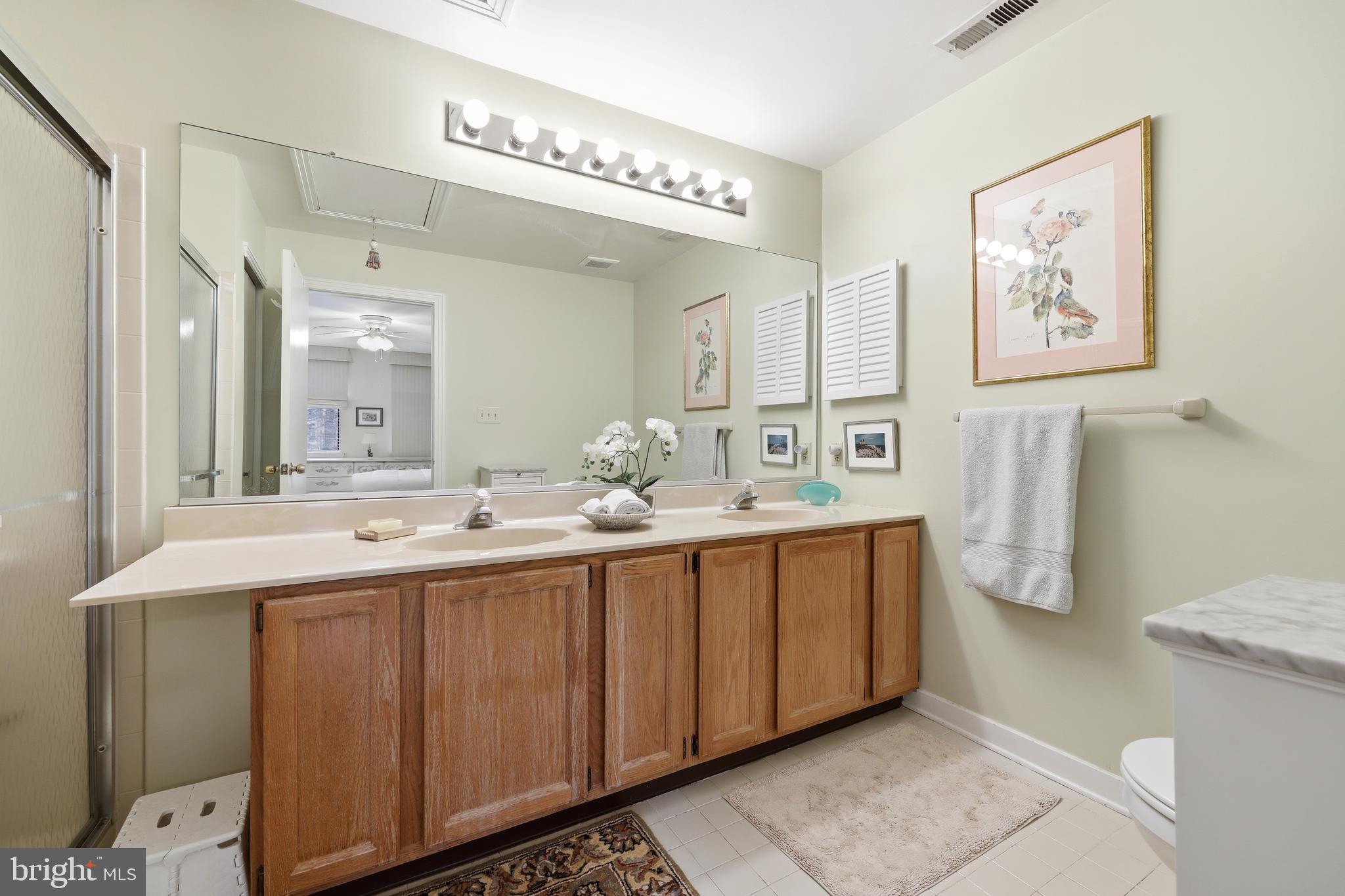 706 Augusta Circle Mount Laurel, NJ 08054 - Photo 22 of 31 a bathroom with a double vanity sink mirror and toilet
