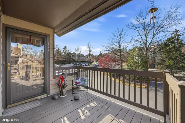 a view of balcony with furniture