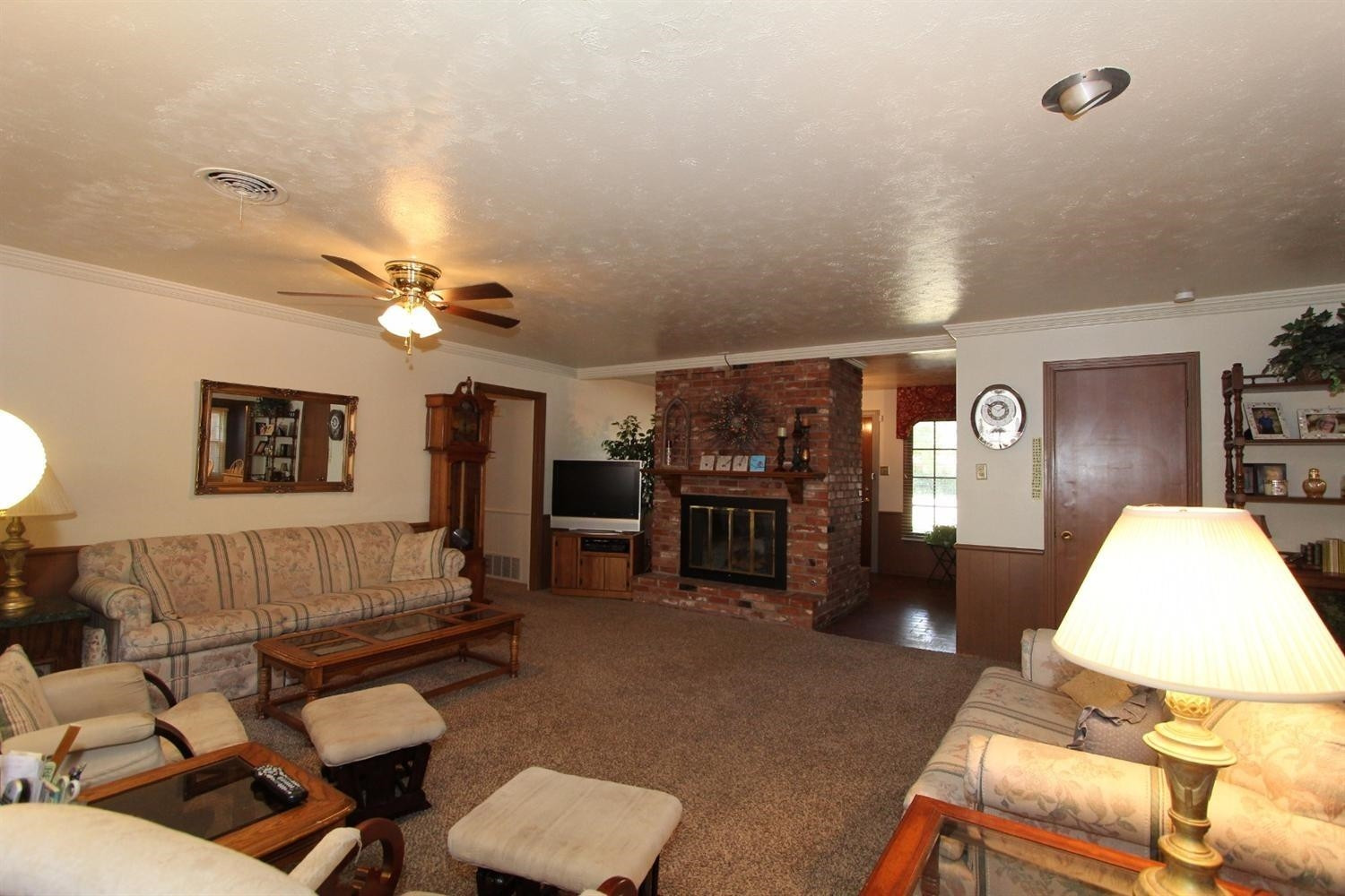 3412 60th Street Lubbock, TX 79413 - Photo 5 of 10 a living room with furniture and dining table