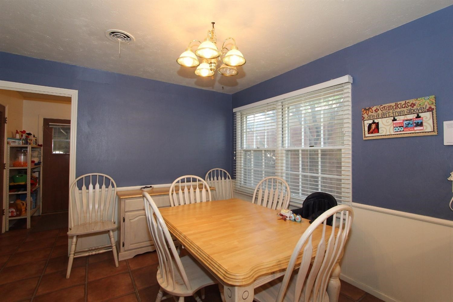 3412 60th Street Lubbock, TX 79413 - Photo 8 of 10 a dining room with furniture and window