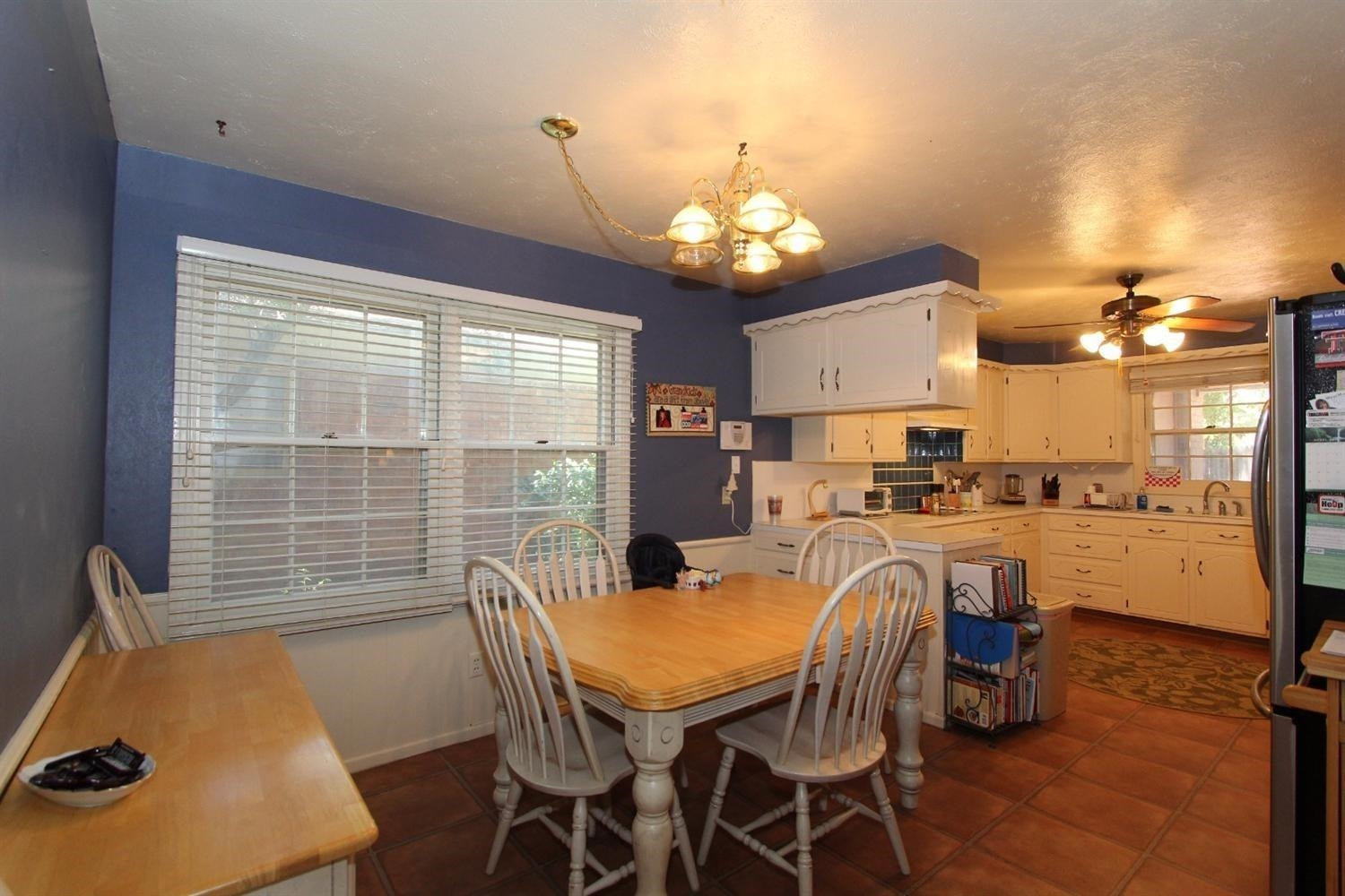 3412 60th Street Lubbock, TX 79413 - Photo 9 of 10 a view of a dining room with furniture window and outside view