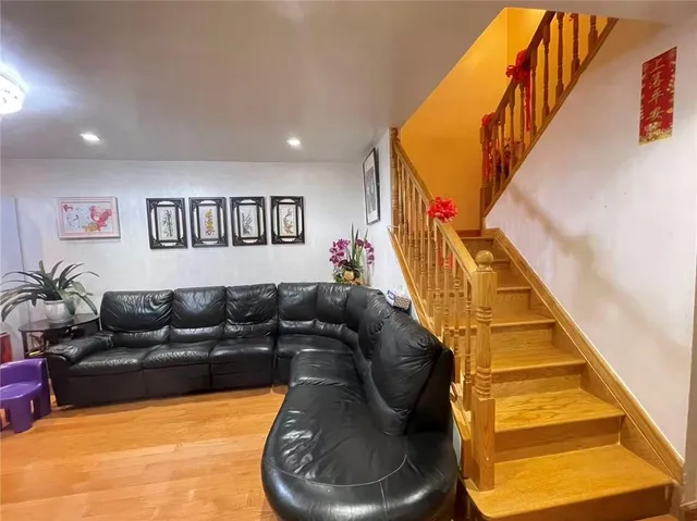 a view of a patio with table and chairs with plants