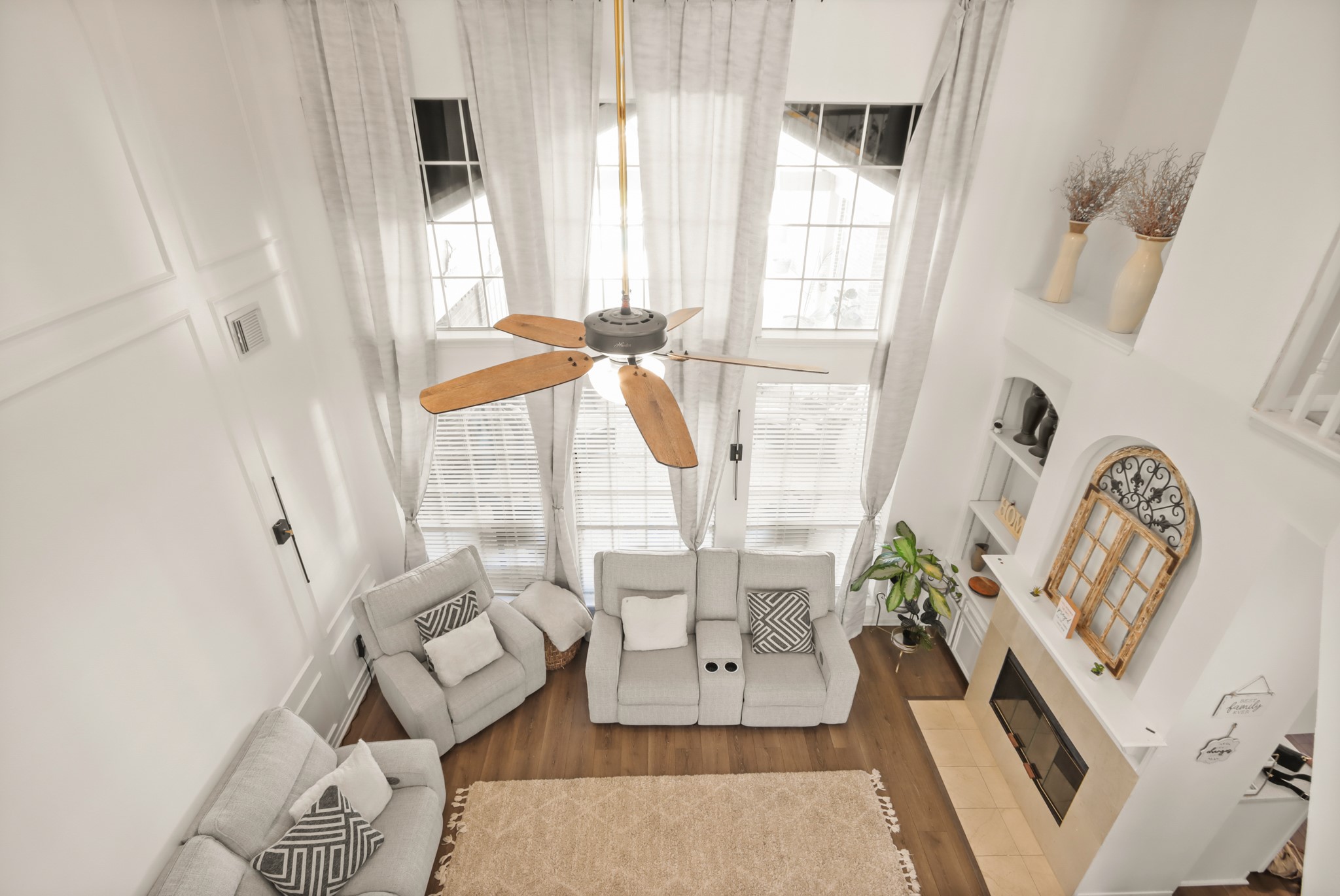 20514 Cannaberry Way Spring, TX 77388 - Photo 23 of 42 Filled with natural light from expansive windows. A dramatic yet inviting setting perfect for gatherings or quiet evenings at home.