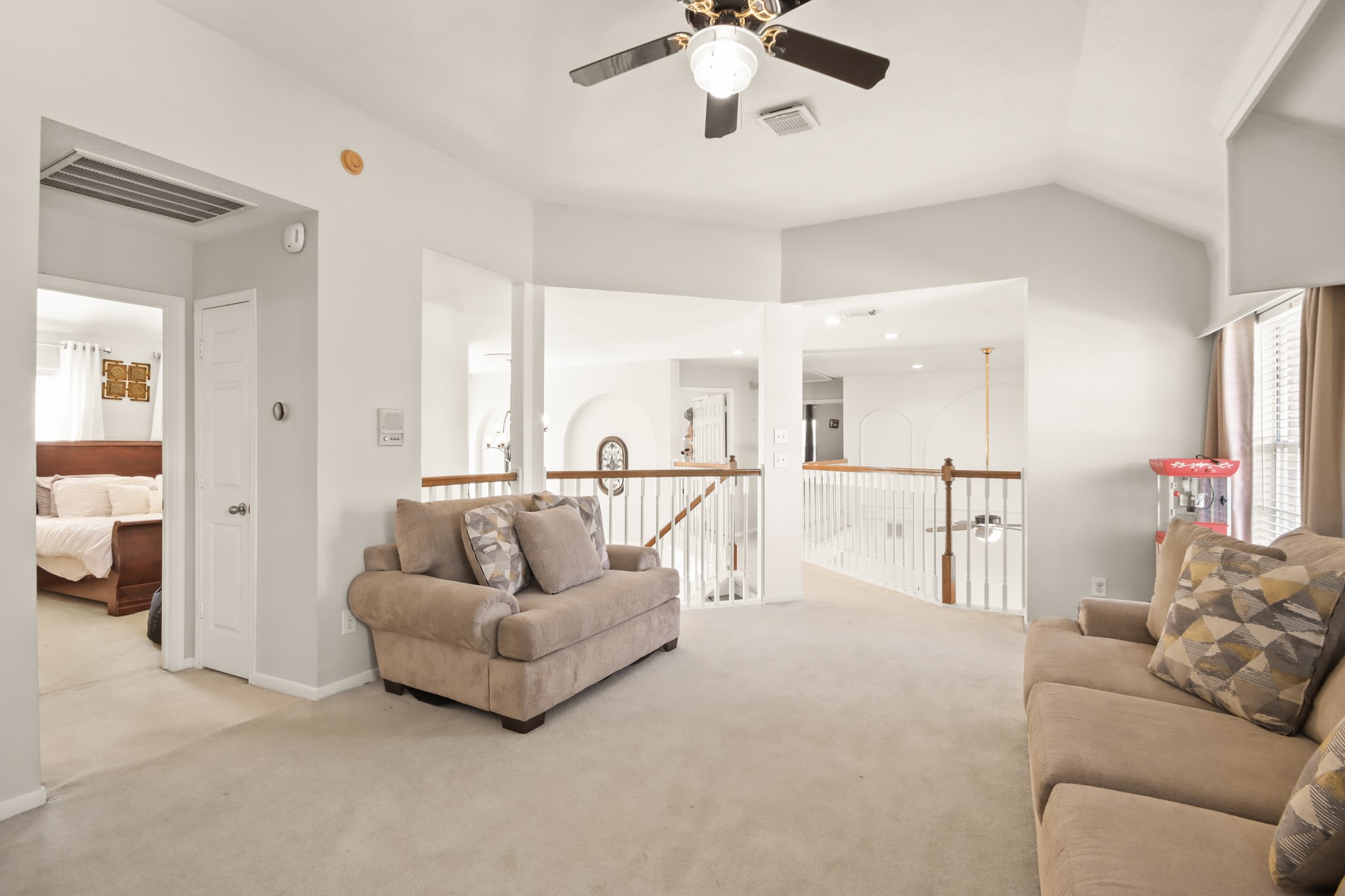20514 Cannaberry Way Spring, TX 77388 - Photo 25 of 42 Bright and spacious upper-level living area offering flexible use options and easy access to nearby bedrooms.
