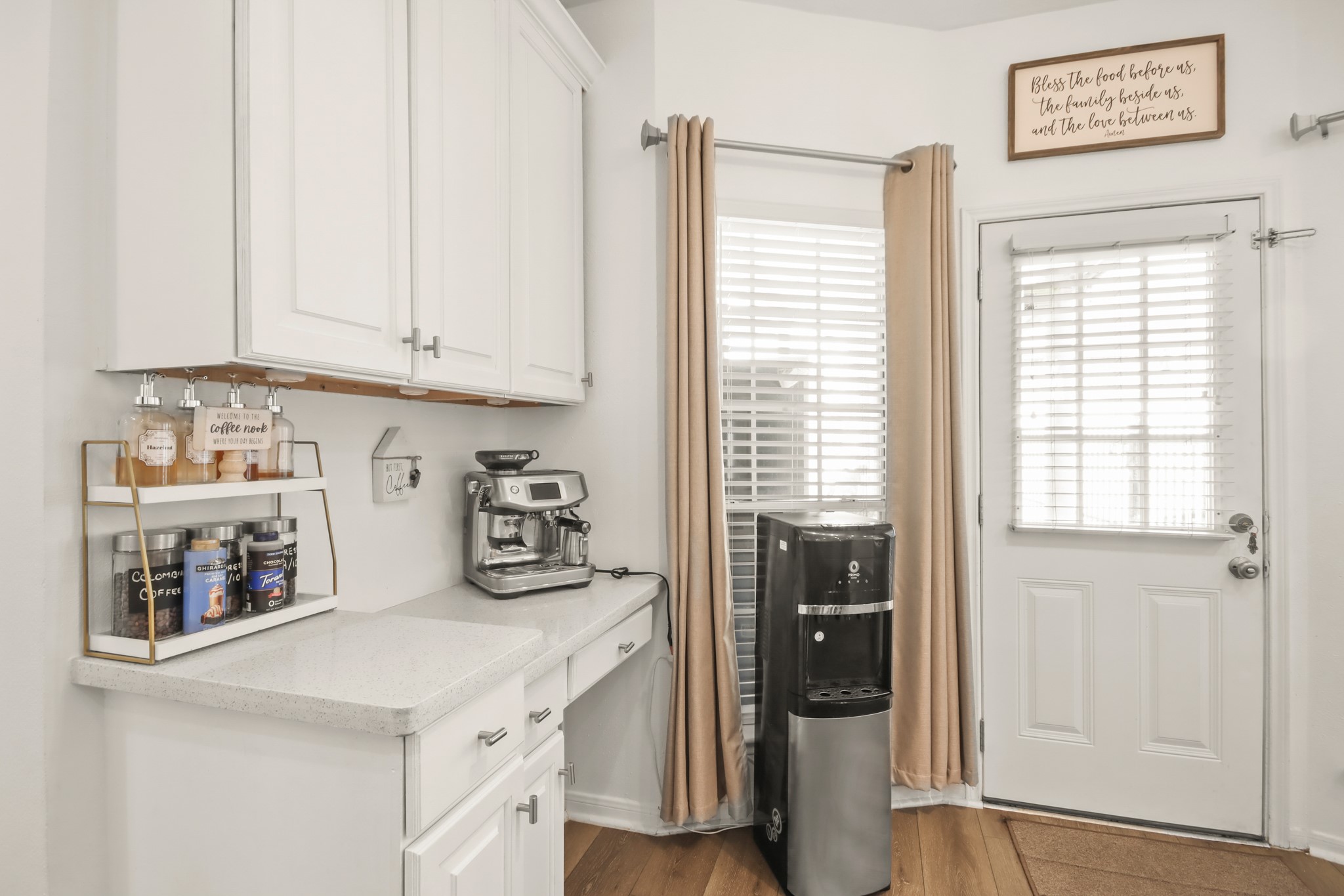 20514 Cannaberry Way Spring, TX 77388 - Photo 9 of 42 Charming beverage or prep station offering additional counter space, storage, and convenience for everyday routines or entertaining needs.