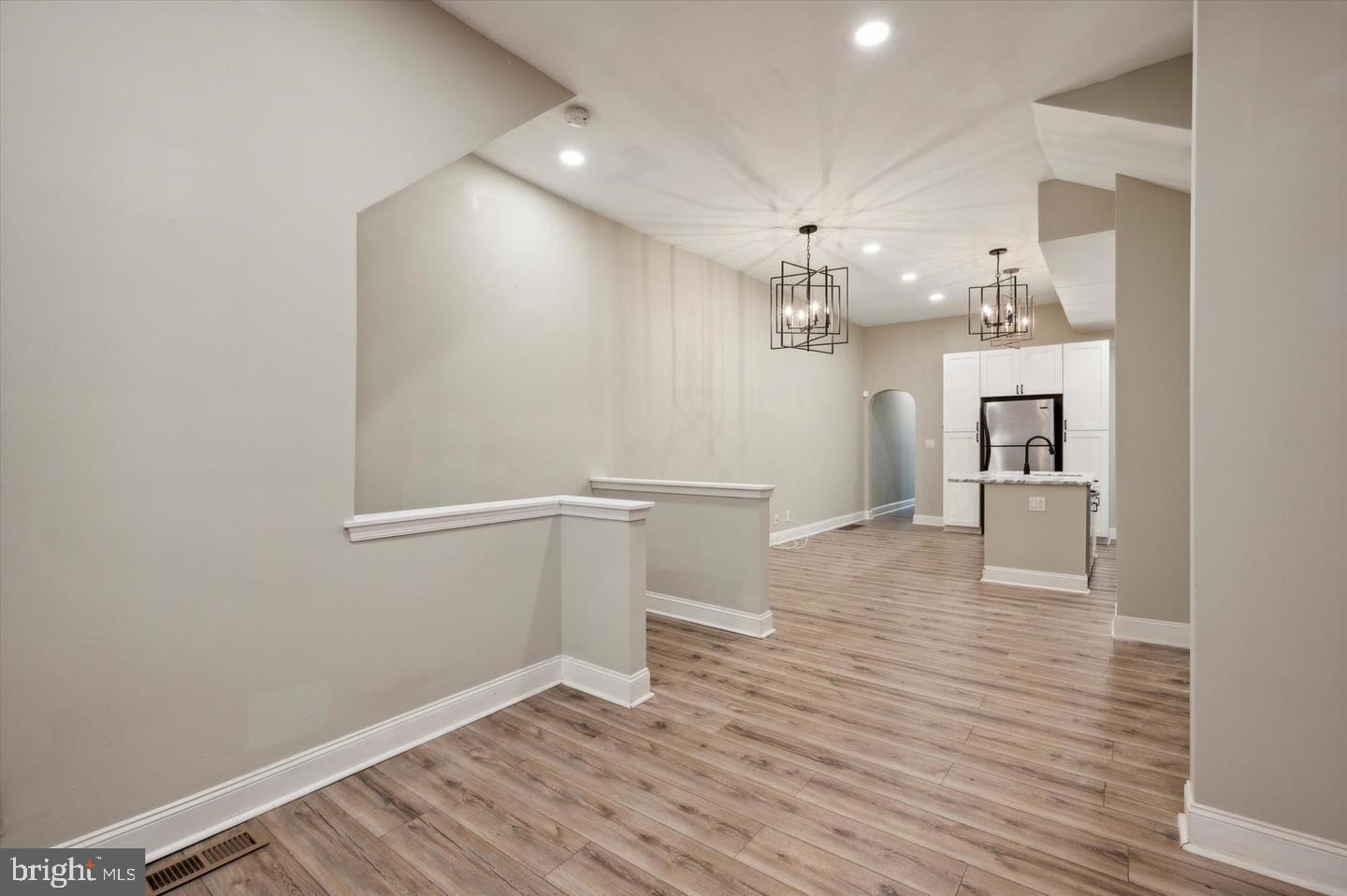 2021 North 33rd Street, Unit 1 Philadelphia, PA 19121 - Photo 5 of 21 a view of a kitchen with wooden floor