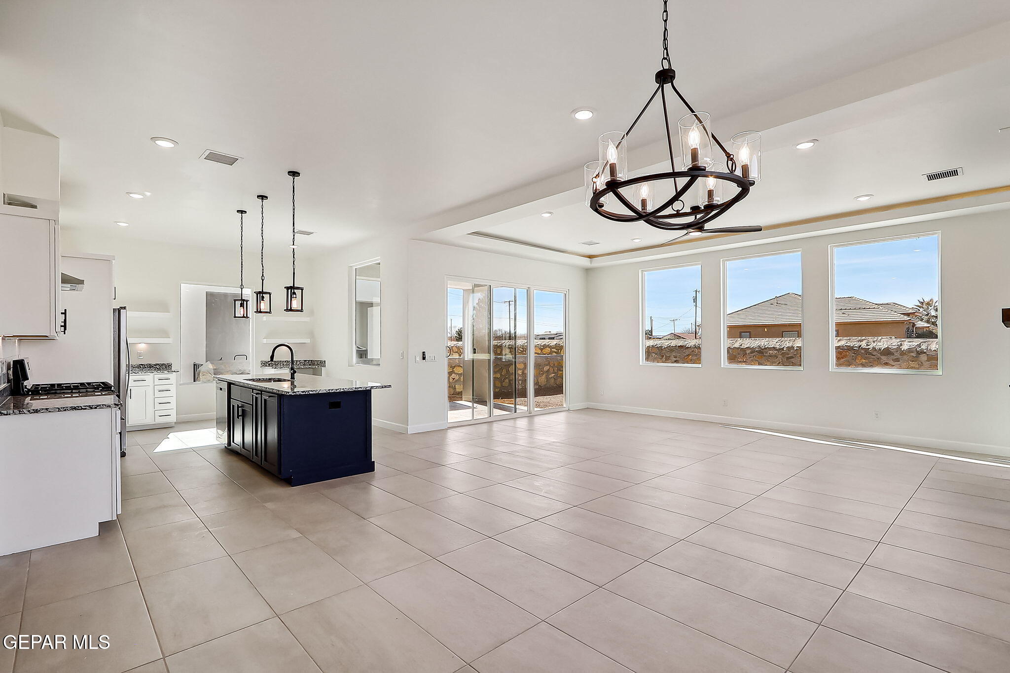 5997 Ruidoso Downs Street El Paso, TX 79932 - Photo 12 of 42 a view of kitchen with refrigerator and window
