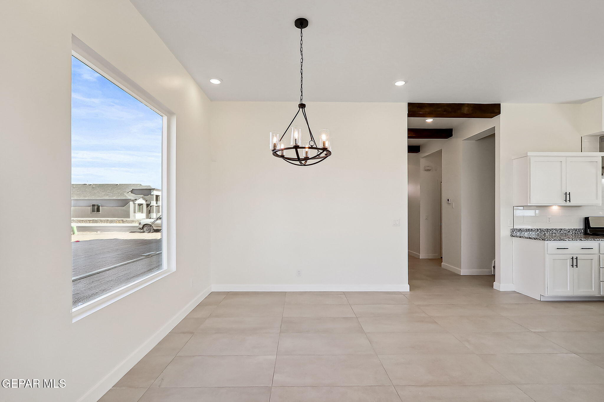 5997 Ruidoso Downs Street El Paso, TX 79932 - Photo 13 of 42 a view of a kitchen and a sink