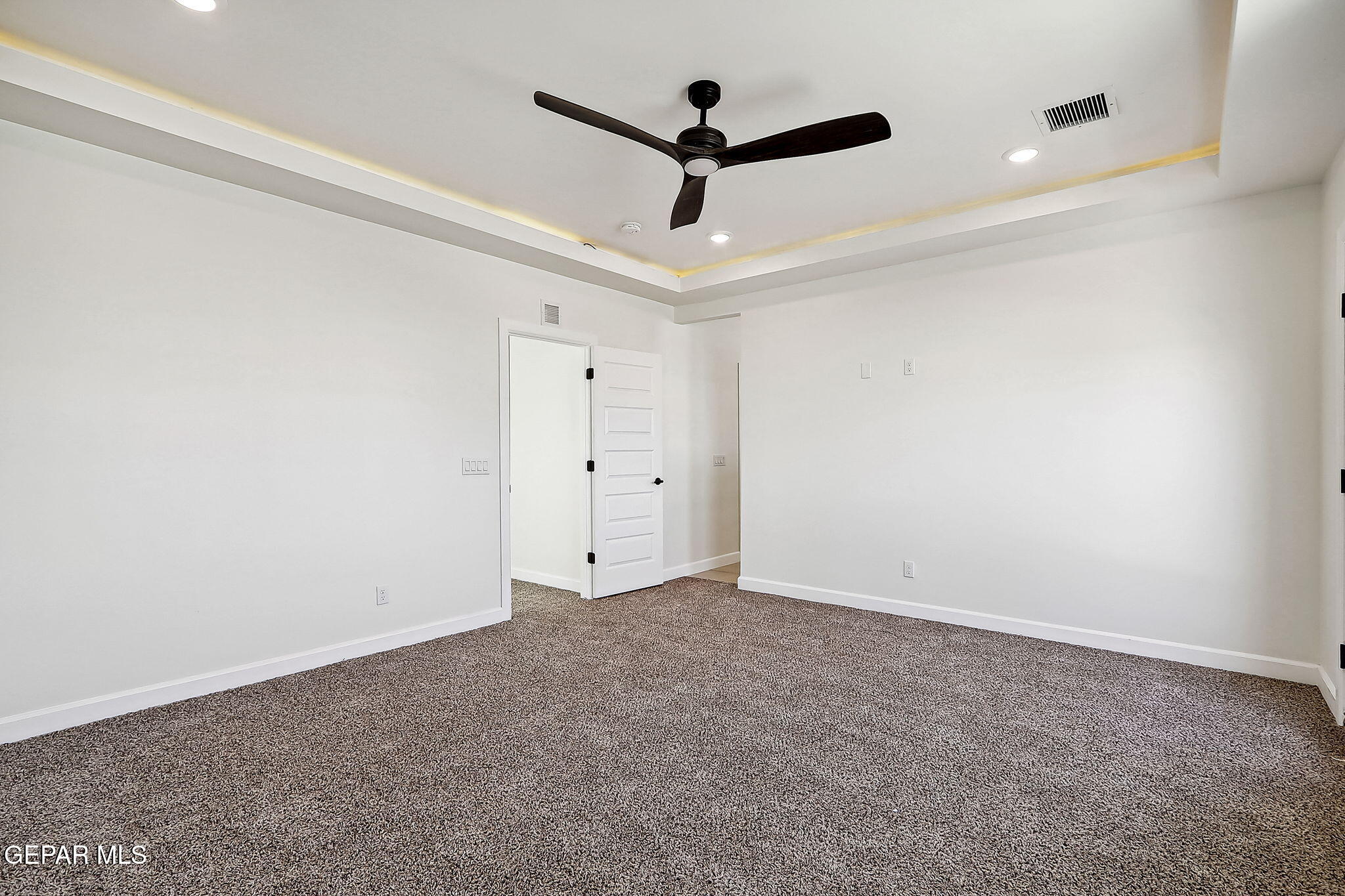 5997 Ruidoso Downs Street El Paso, TX 79932 - Photo 23 of 42 a view of a room with a ceiling fan