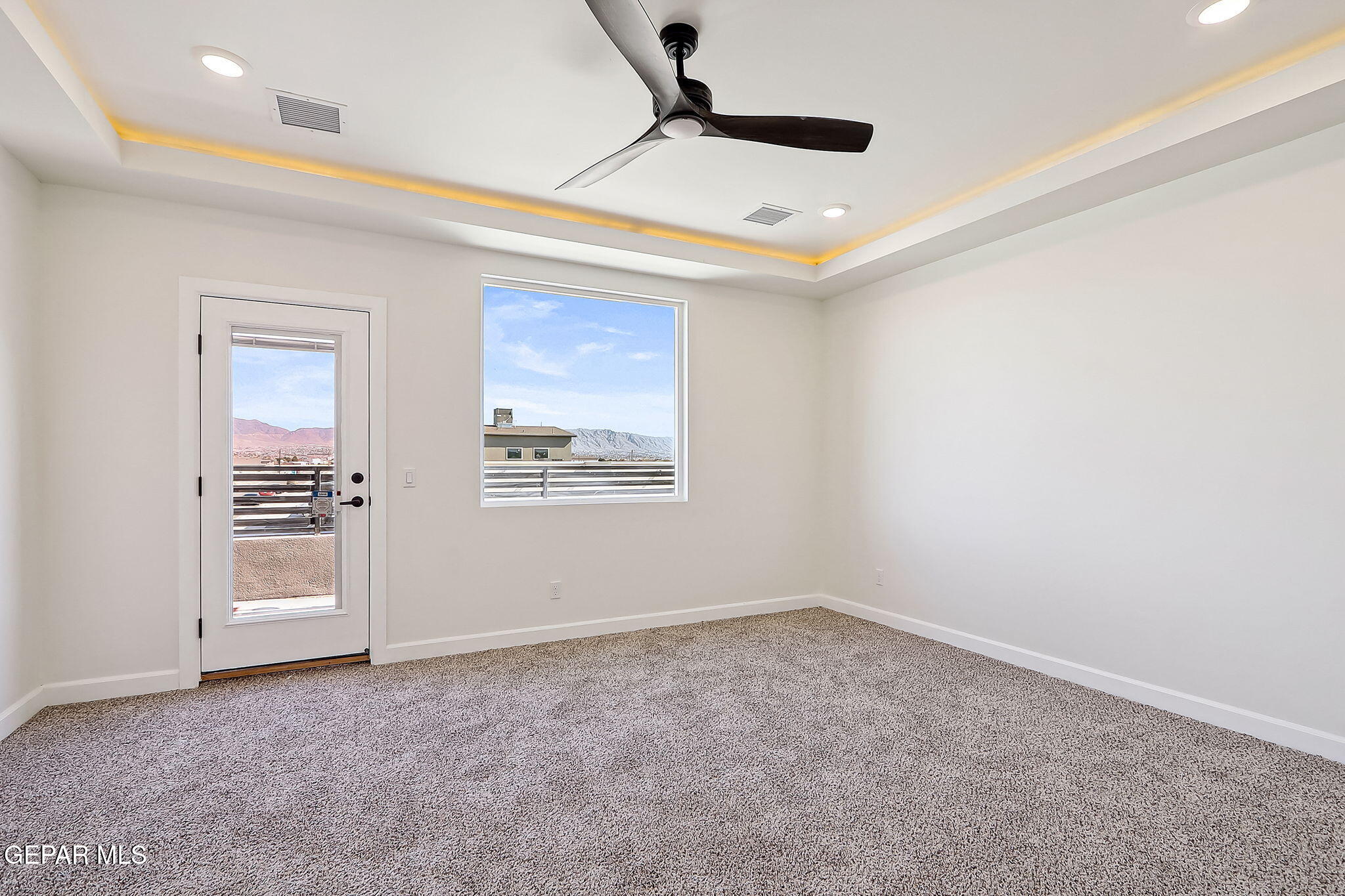 5997 Ruidoso Downs Street El Paso, TX 79932 - Photo 24 of 42 an empty room with windows