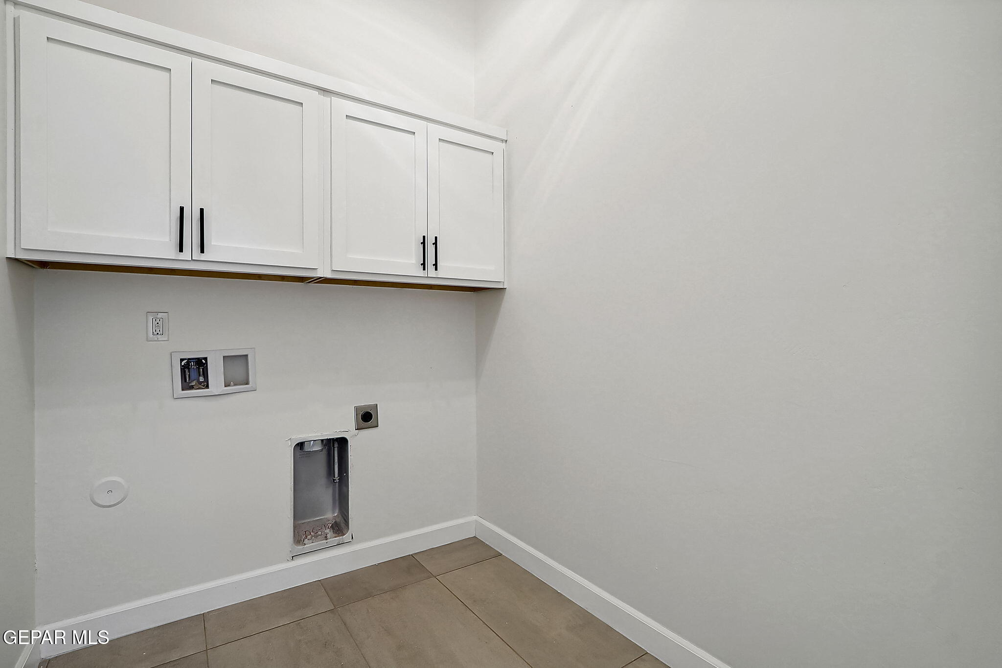 5997 Ruidoso Downs Street El Paso, TX 79932 - Photo 37 of 42 a view of a closet area with wooden floor