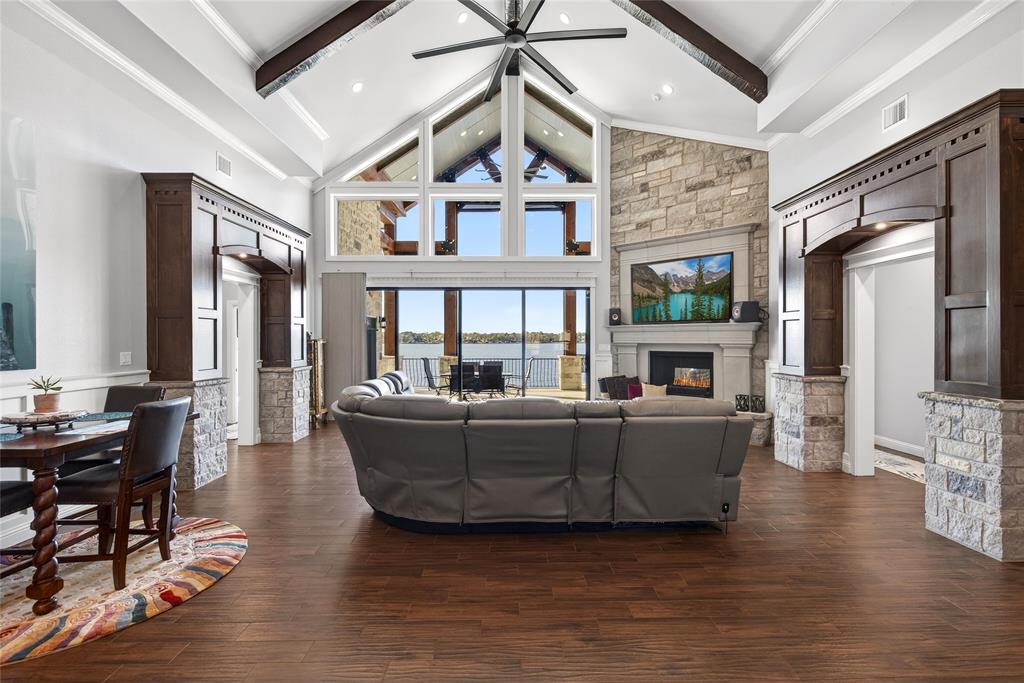 14392 Ridge Lane Malakoff, TX 75148 - Photo 13 of 39 a living room with furniture a fireplace and a chandelier
