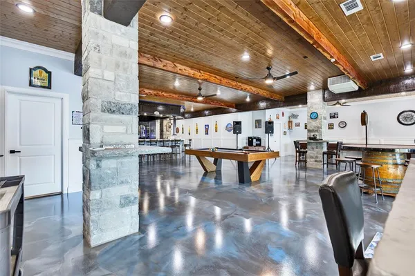 a dinning table and chairs in a kitchen