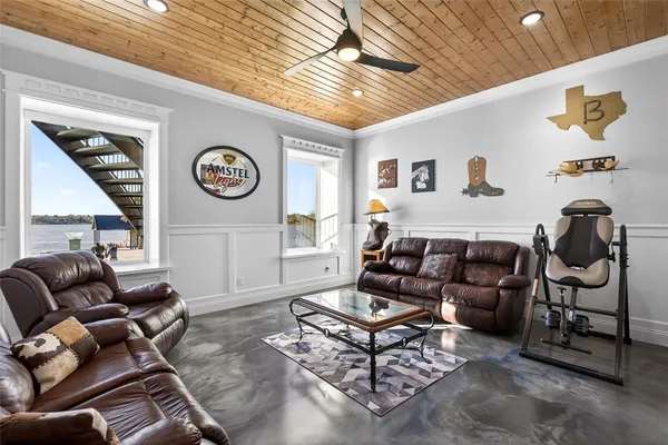 a kitchen with a refrigerator and a stove