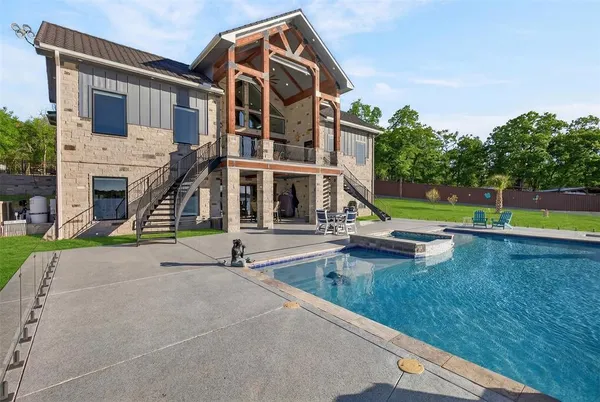 a living room with furniture or outdoor view and a fireplace
