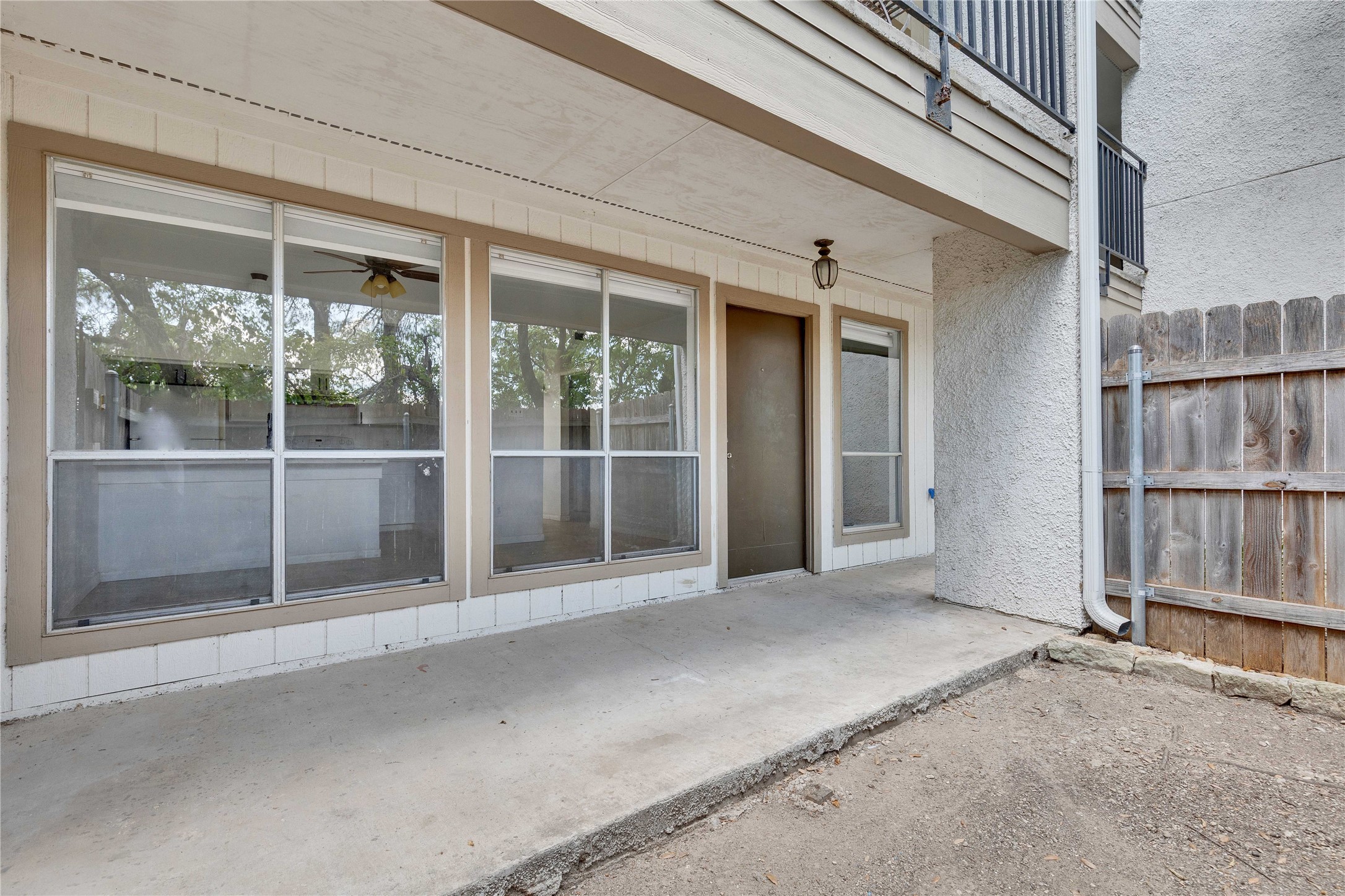 6910 Hart Lane, Unit 403 Austin, TX 78731 - Photo 19 of 20 a view of an empty room with a window