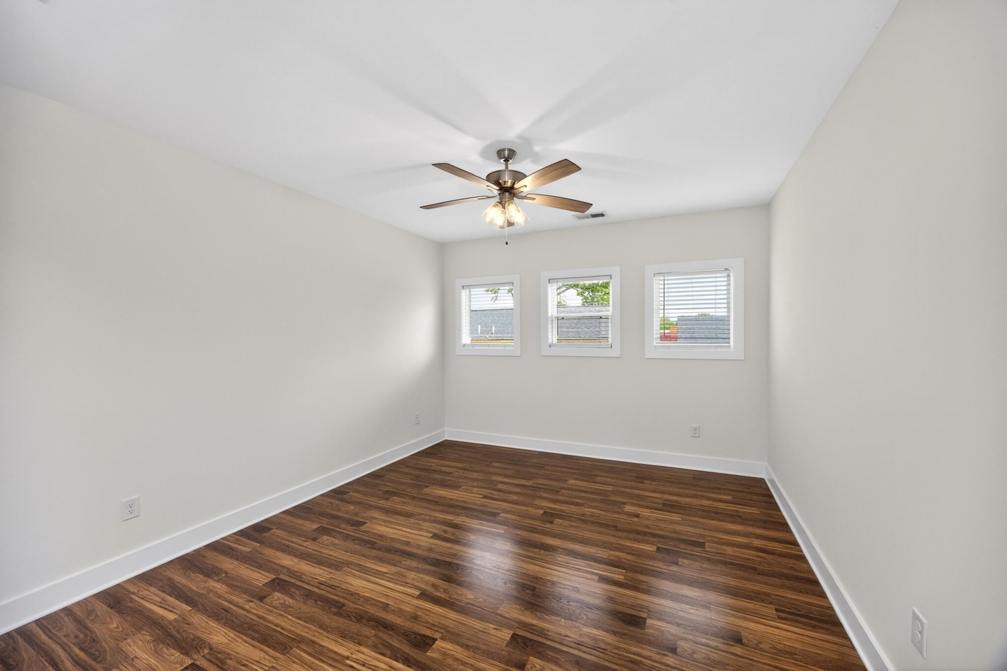 7 Decatur Street Nashville, TN 37210 - Photo 26 of 43 wooden floor in an empty room with a window
