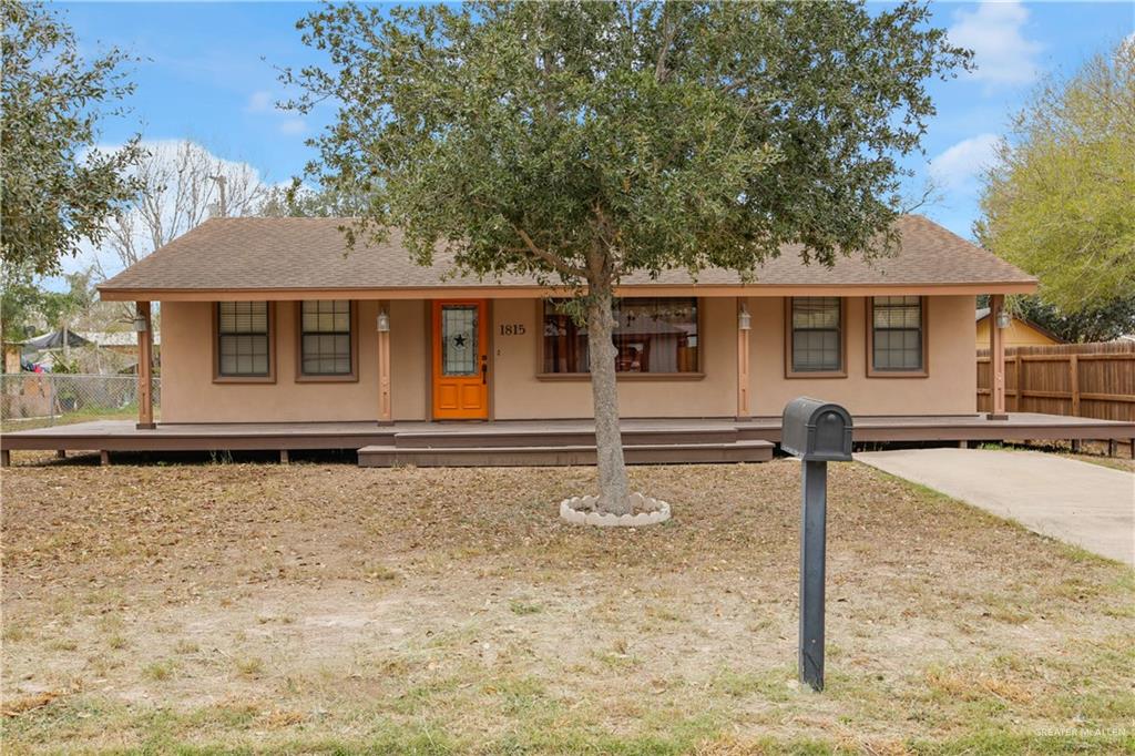 1815 Thornton Street Mission, TX 78572 - Photo 24 of 27 View of front of home featuring roof with shingles and covered porch