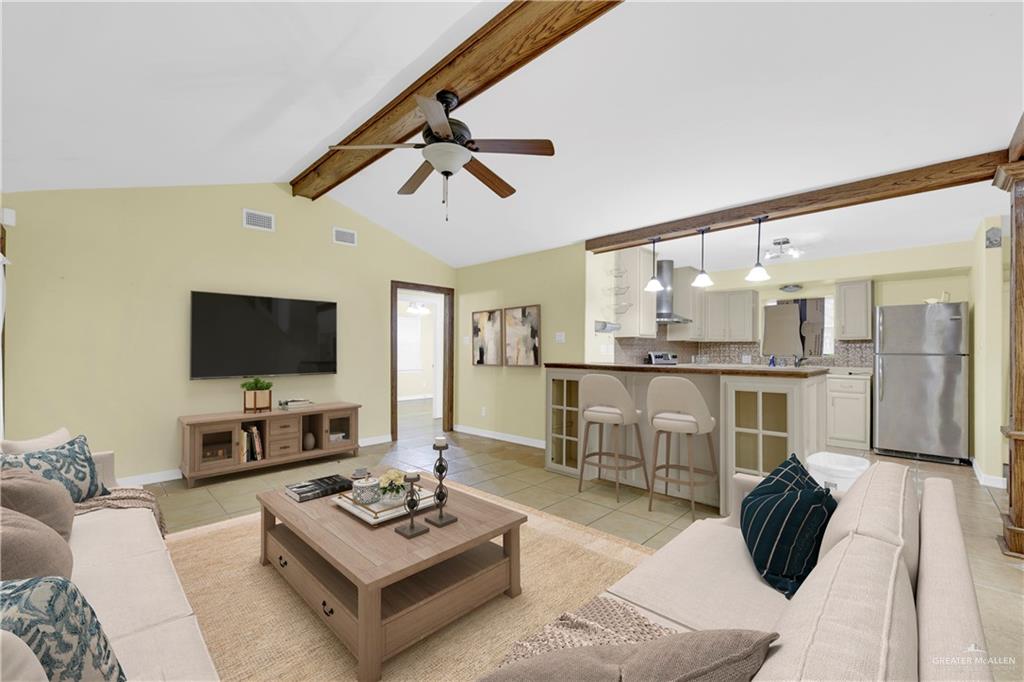1815 Thornton Street Mission, TX 78572 - Photo 3 of 27 Living area with light tile patterned flooring and ceiling fan
