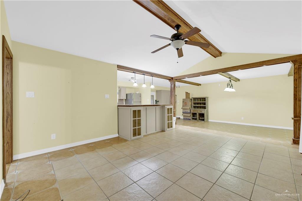 1815 Thornton Street Mission, TX 78572 - Photo 8 of 27 Unfurnished living room with a ceiling fan and light tile patterned flooring