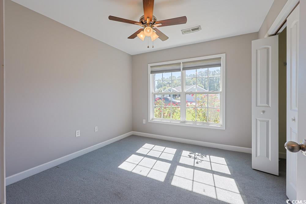 1036 Macala Drive Conway, SC 29527 - Photo 23 of 34 Carpeted empty room with baseboards and a ceiling fan