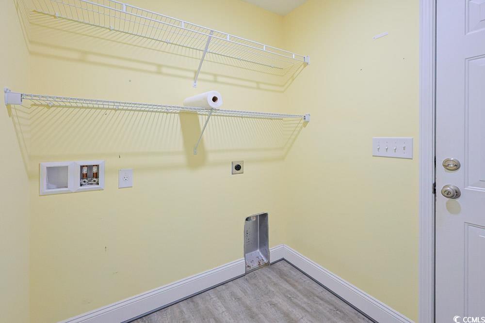 1036 Macala Drive Conway, SC 29527 - Photo 24 of 34 Laundry area featuring washer hookup, light wood-style flooring, and hookup for an electric dryer