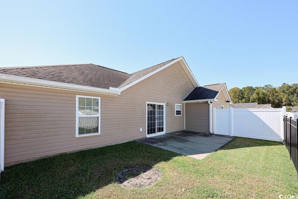 1036 Macala Drive Conway, SC 29527 - Photo 30 of 34 Rear view of house with a patio and a shingled roof