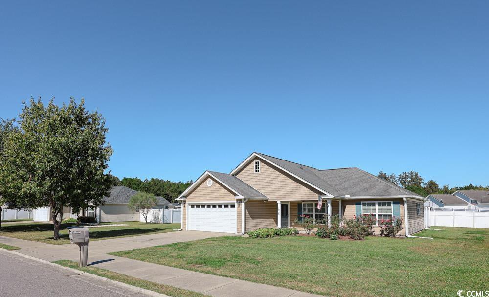 1036 Macala Drive Conway, SC 29527 - Photo 31 of 34 View of front of property featuring driveway, a porch, and an attached garage