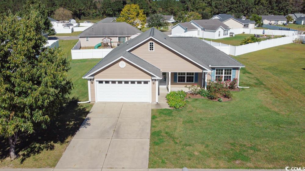 1036 Macala Drive Conway, SC 29527 - Photo 33 of 34 View of front of house featuring concrete driveway, a garage, and a residential view