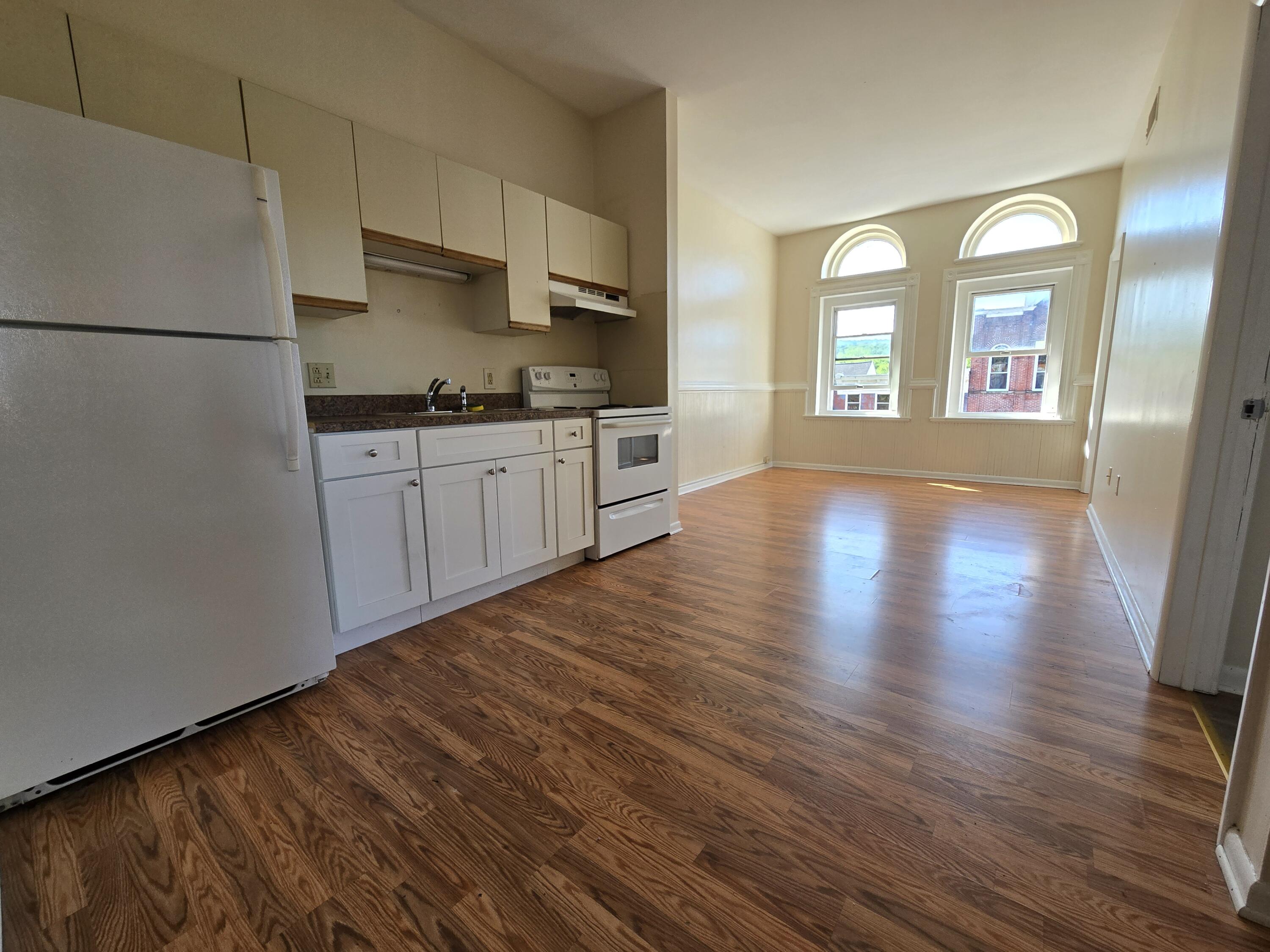 584 Main Street, Unit 8 Stroudsburg, PA 18360 - Photo 2 of 7 Kitchen and Living Room