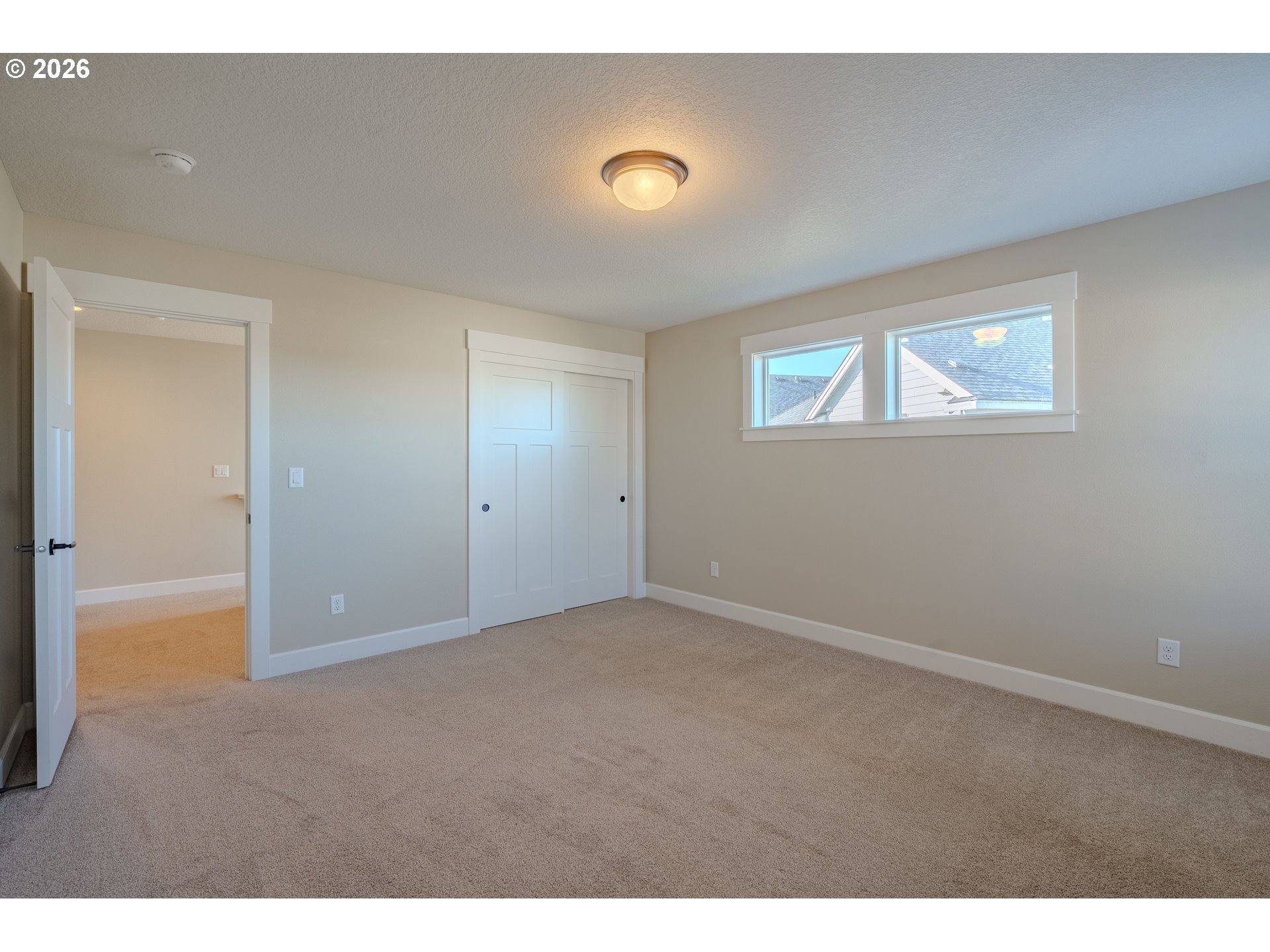 1145 South Quail Run Place Ridgefield, WA 98642 - Photo 24 of 41 a view of an empty room with a window