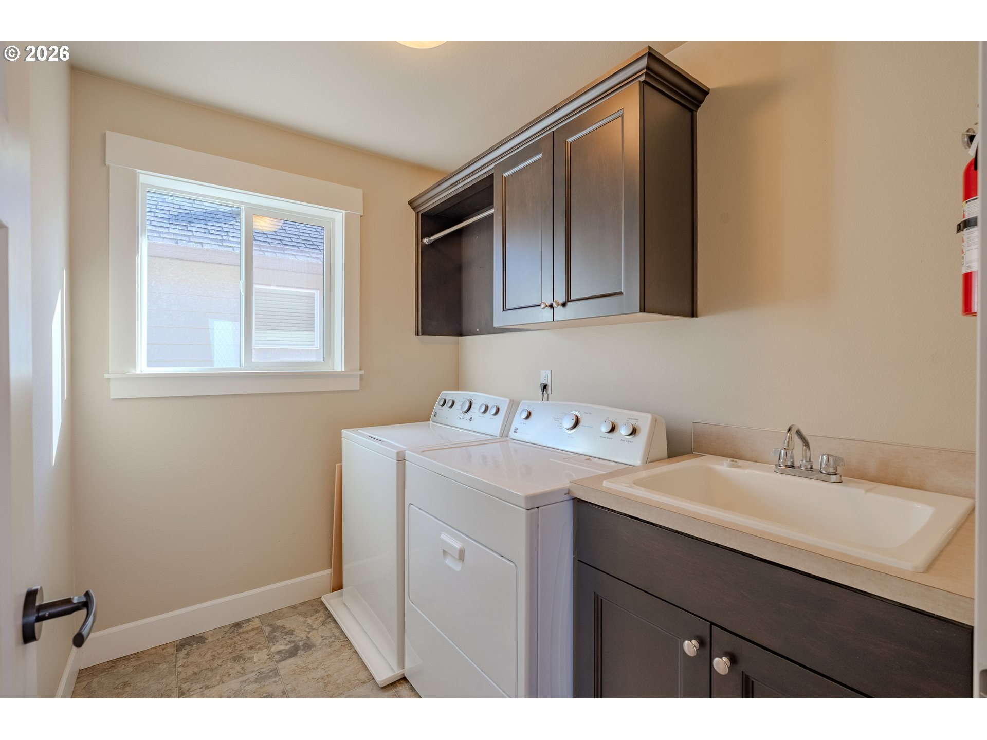 1145 South Quail Run Place Ridgefield, WA 98642 - Photo 26 of 41 a utility room with closet dryer and washer