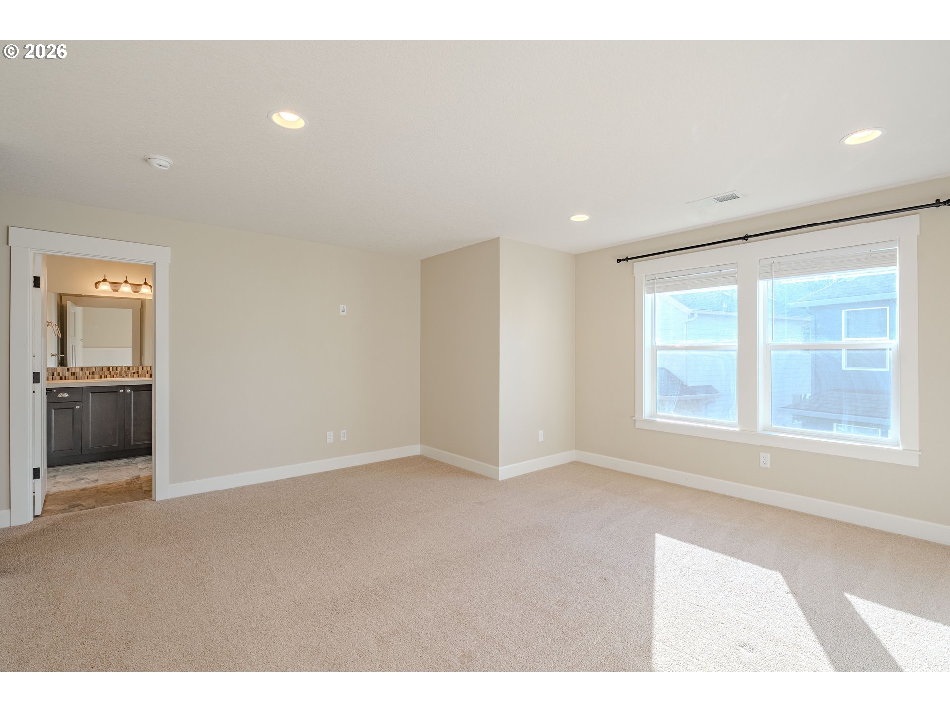 1145 South Quail Run Place Ridgefield, WA 98642 - Photo 32 of 41 a view of an empty room with a window