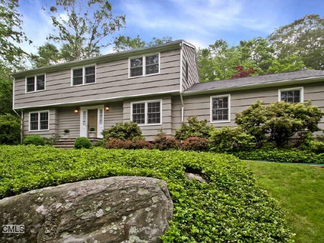 220 Linden Tree Road Wilton, CT 06897 - Photo 1 of 1 front view of a house with a yard