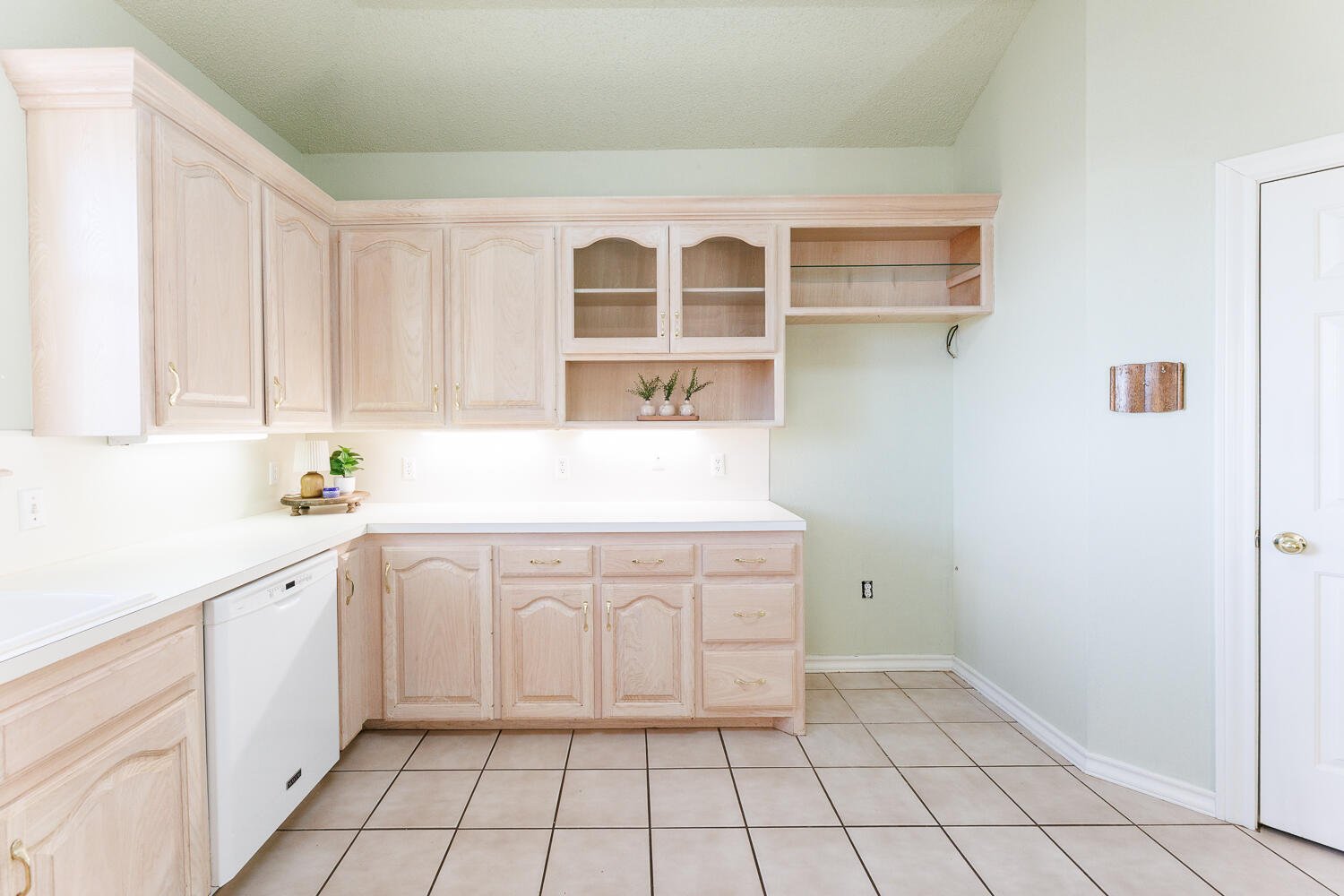 206 Collins Avenue Sundown, TX 79372 - Photo 24 of 82 a utility room with a sink a vanity and window