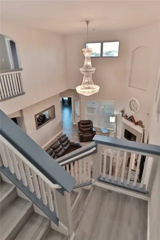 a view of a living room and wooden floor