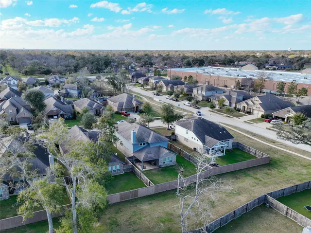 an aerial view of residential building with parking space