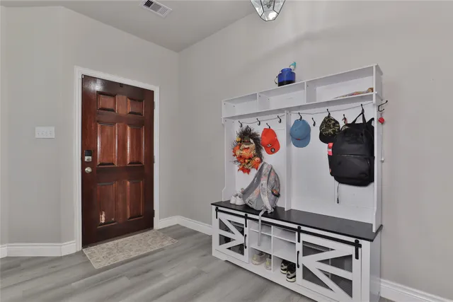 a view of a closet with storage