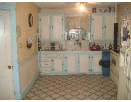 101 Samuel Street Springfield, MA 01109 - Photo 8 of 8 a bathroom with a sink a toilet and shower