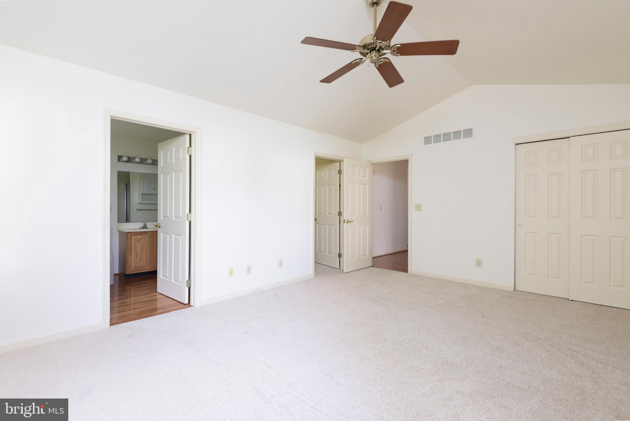 403 East Glenview Drive West Grove, PA 19390 - Photo 13 of 25 an empty room with closet and a ceiling fan