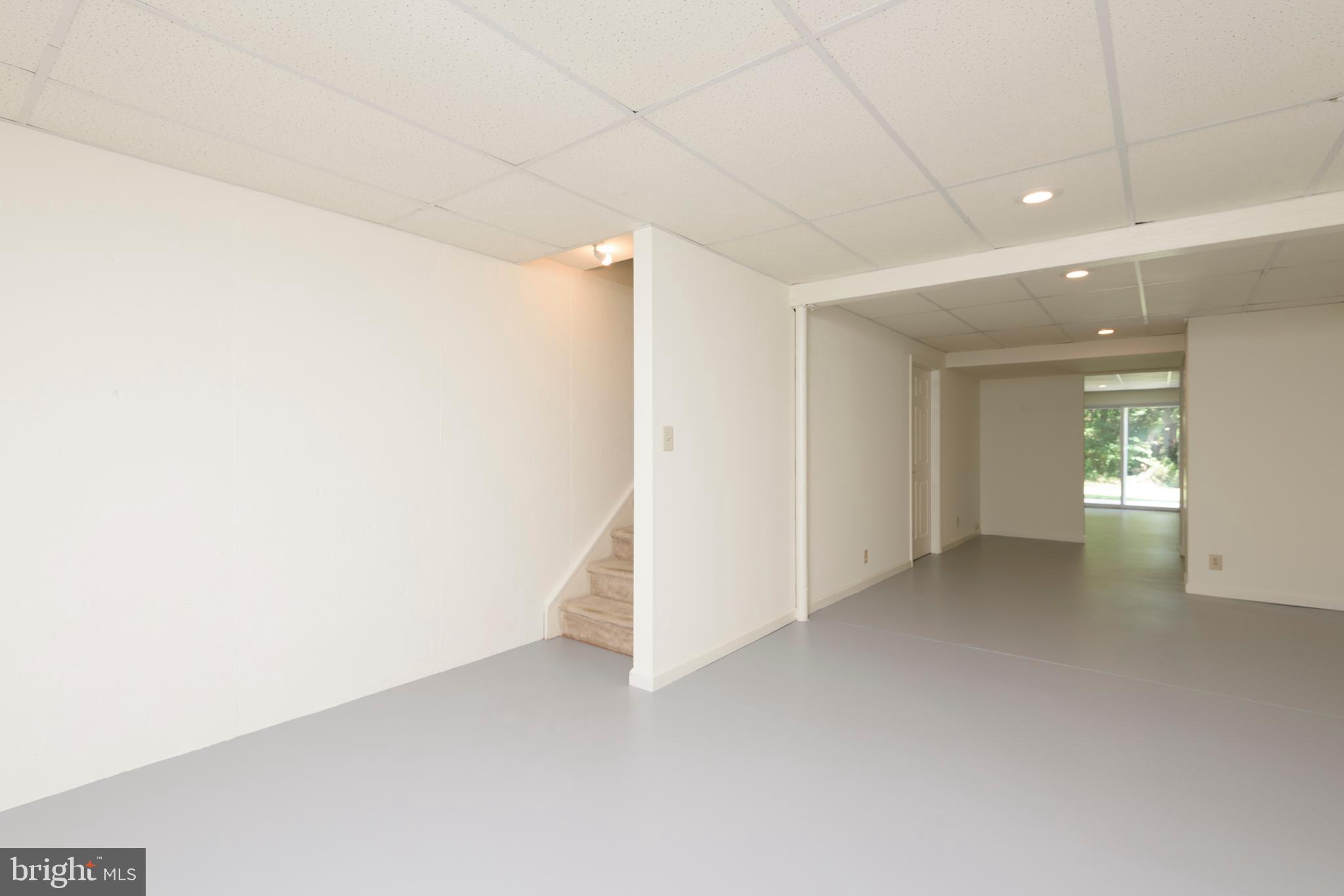 403 East Glenview Drive West Grove, PA 19390 - Photo 19 of 25 a view of a big room with closet and chandelier fan