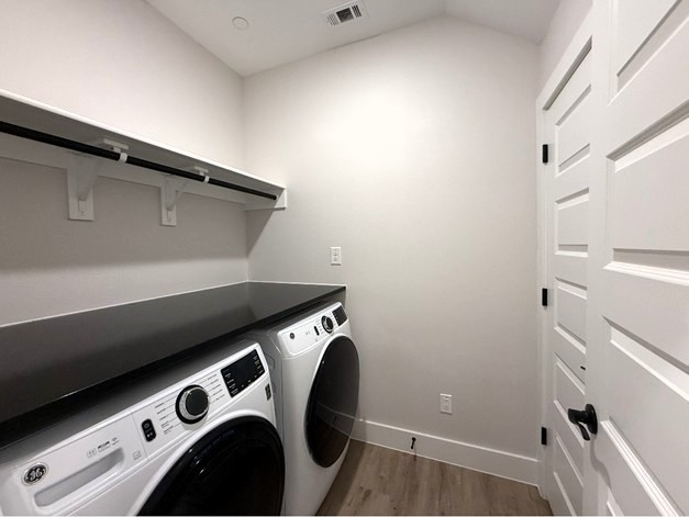 5601 Mobeetie Loop Bee Cave, TX 78738 - Photo 18 of 23 a utility room with dryer and washer